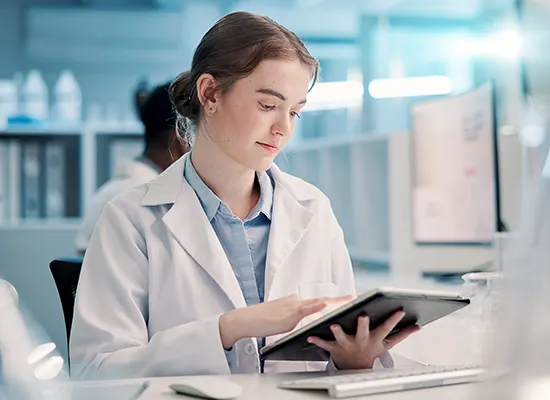 science-student-woman-on-tablet